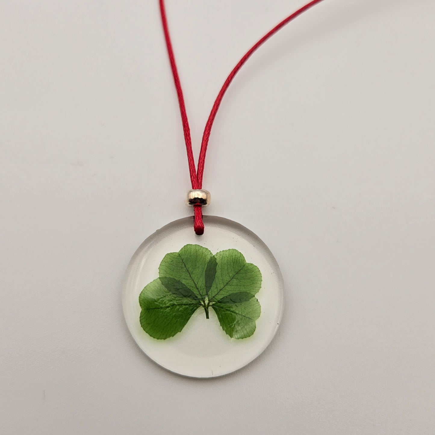 Clover necklace red cord