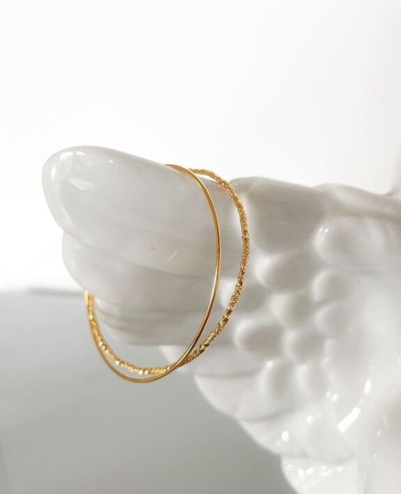 Gilded open bangle bracelet