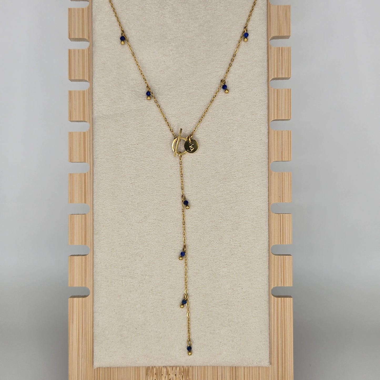 Long chain necklace blue stones