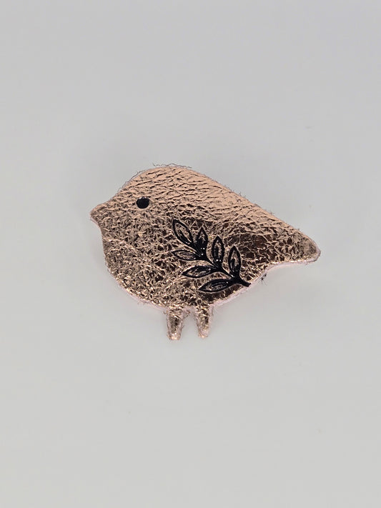 Gilded bird brooch