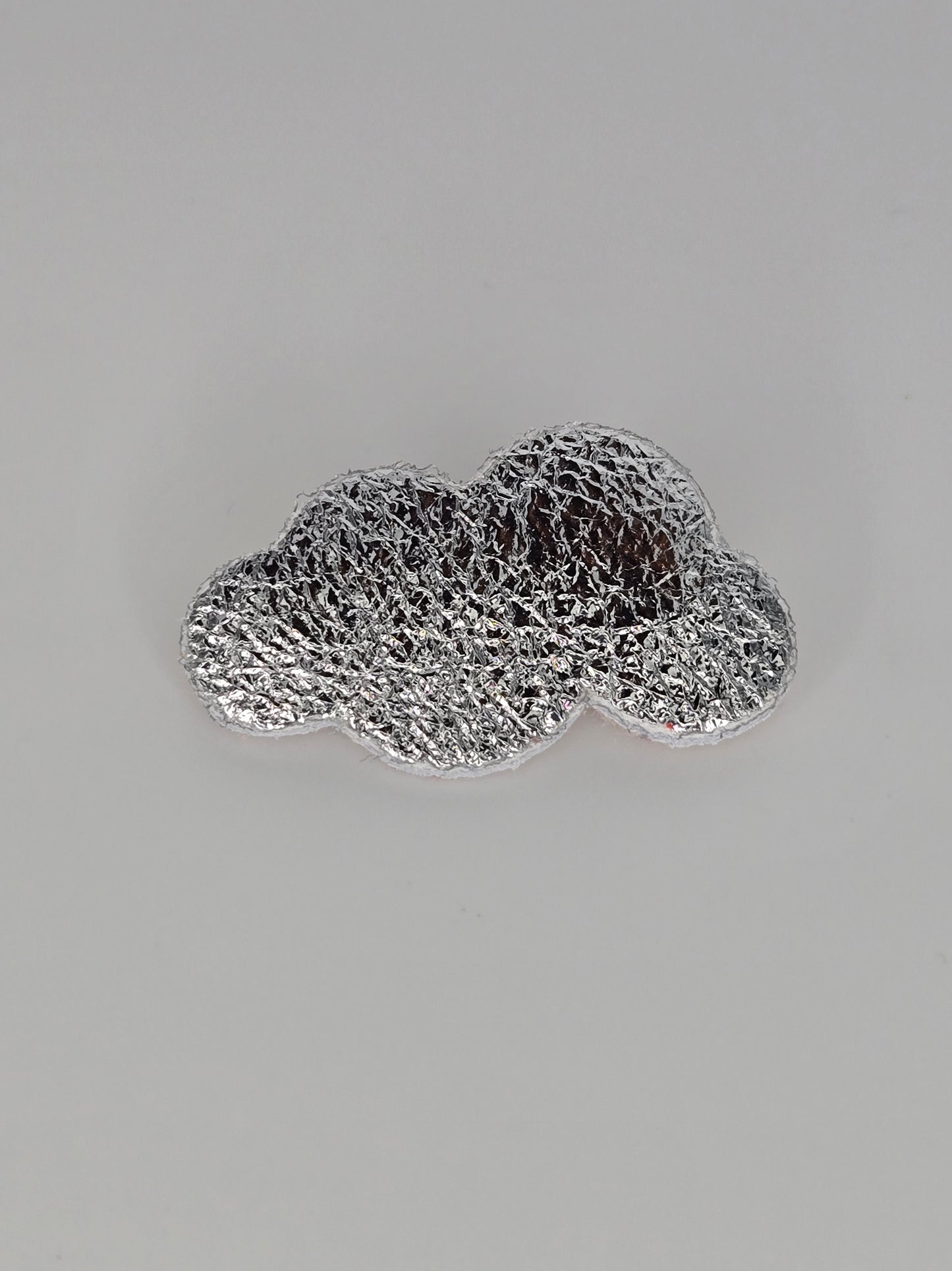 Silvered cloud brooch