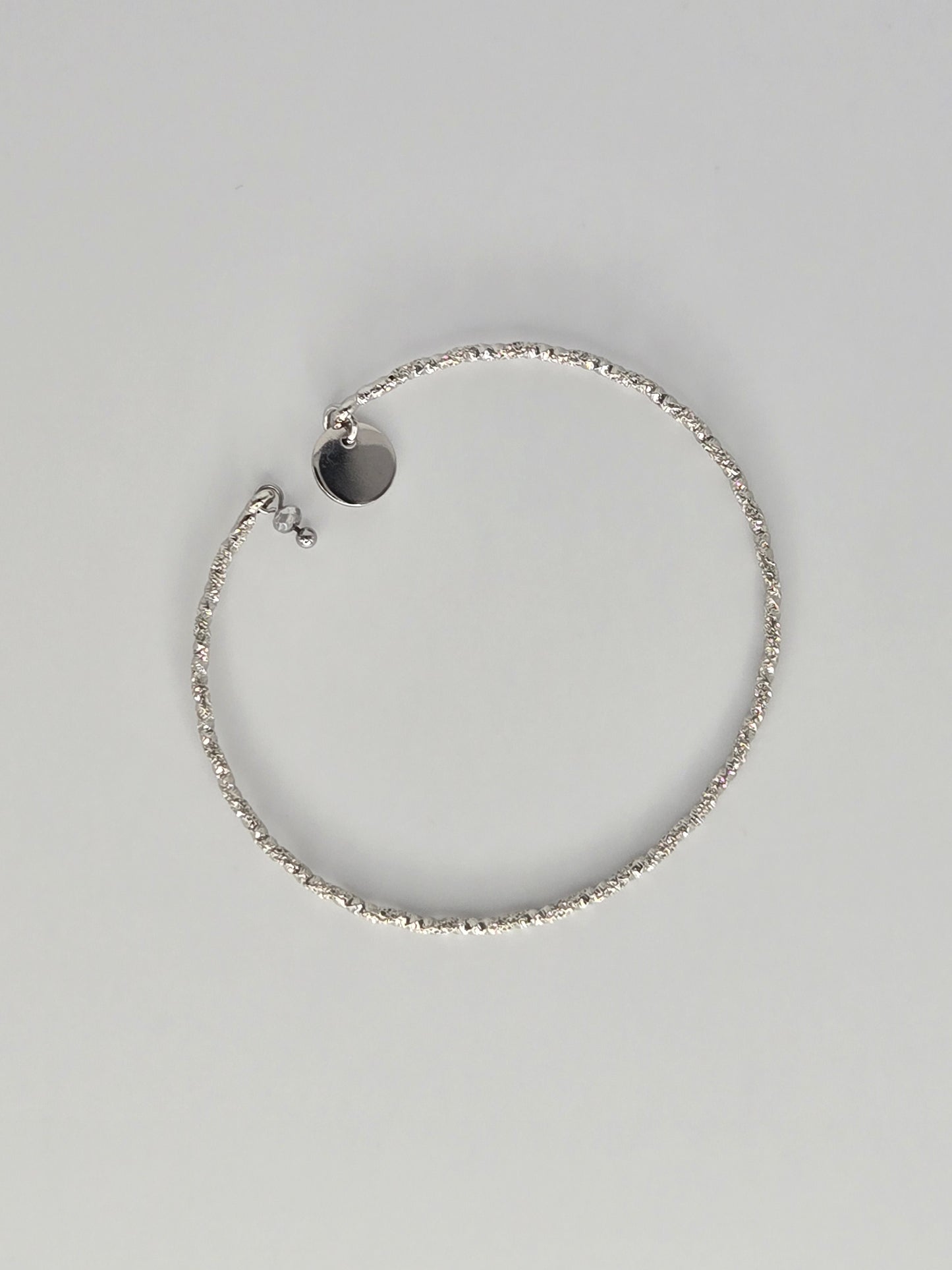 Twisted silvered open bangle bracelet