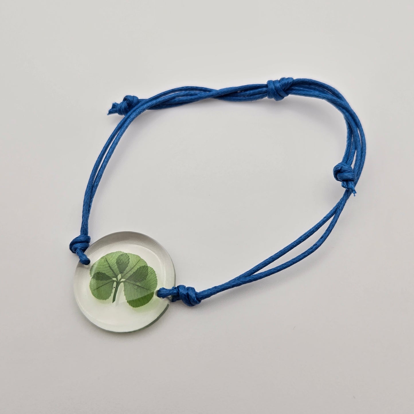 Clover bracelet blue cord