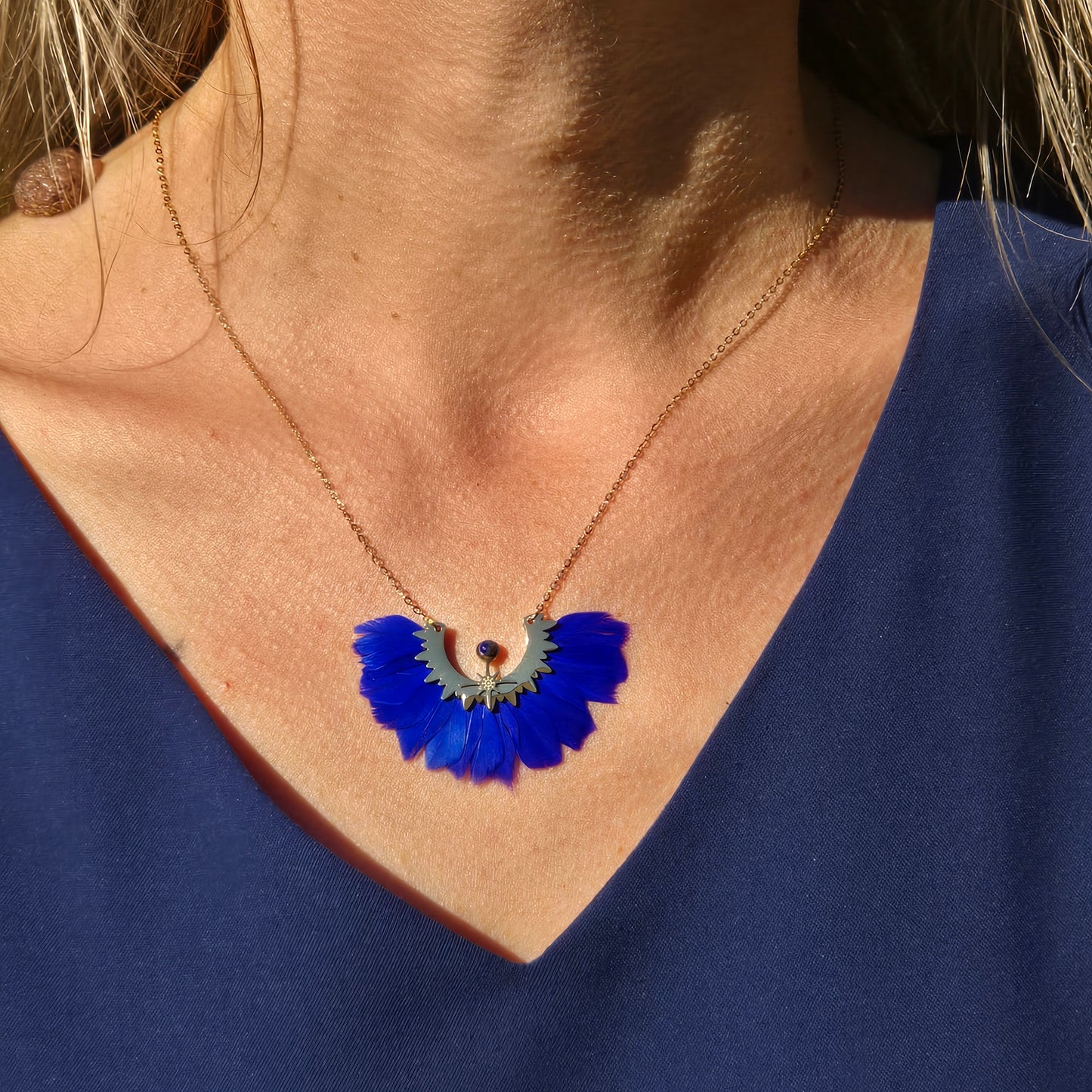 Necklace blue feathers