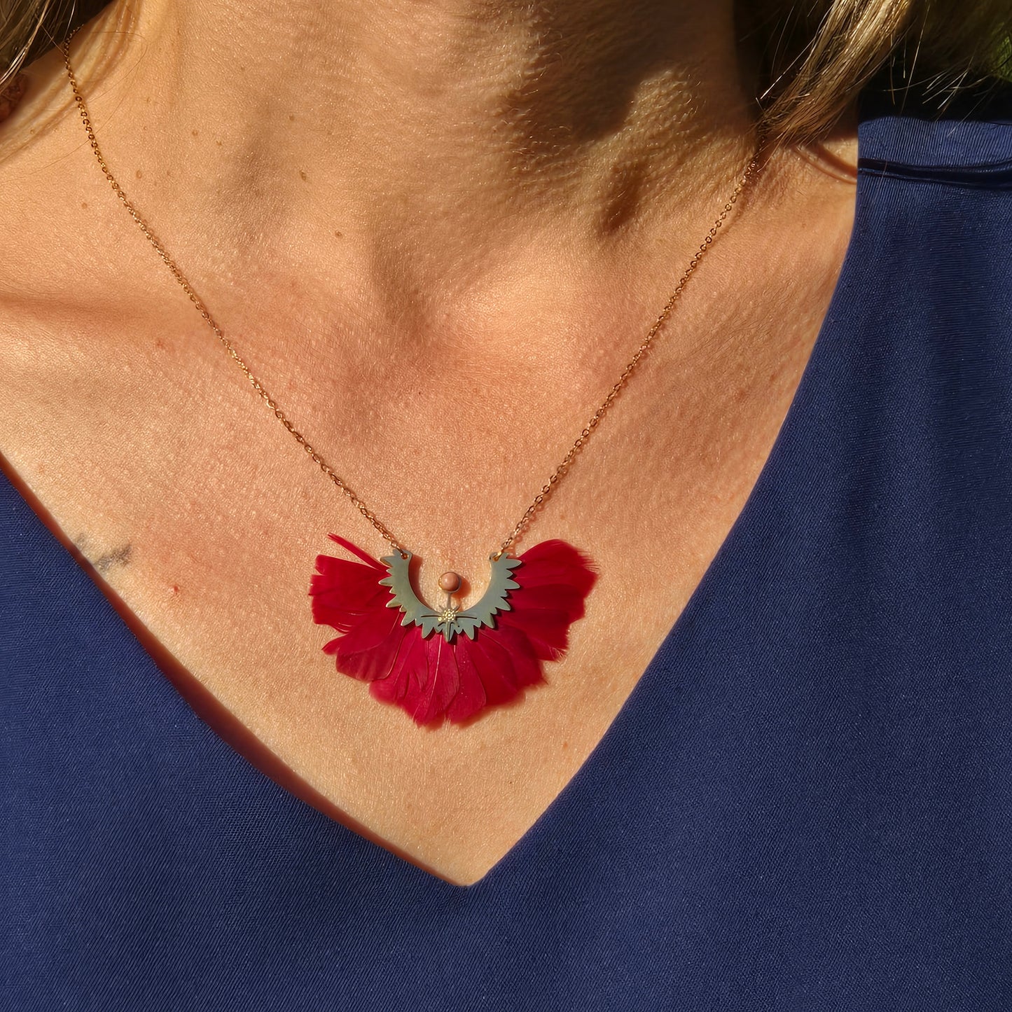 Necklace red feathers