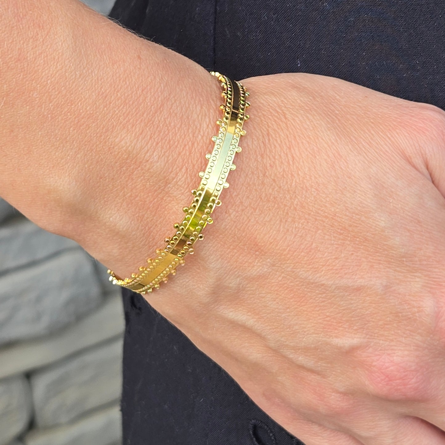 large bangle silvered or gilded