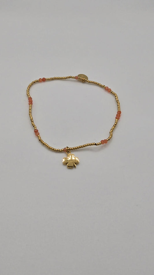 Clover bracelet gilded and orange beads